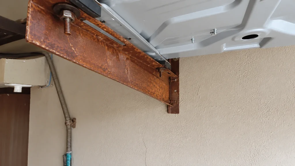 Rusty Bracket Supporting Utility Unit